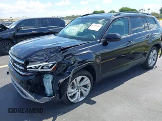 2021 Volkswagen Atlas SE with VIN 1V2WR2CA1MC607768, listed as a IAAI auction lot 42518885 with 49,286 mi miles and . Bid and sale history available at DreamBid. Image 18.