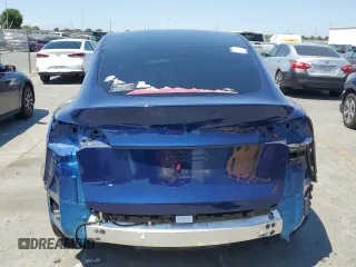 2024 Tesla Model Y z VIN 7SAYGDED9RF005104, wystawiony jako Copart lot #64974545 z przebiegiem 20 422 mil mil oraz Szkoda całkowita • Salvage title. Historia ofert i sprzedaży dostępna na DreamBid. Obrazek 6.