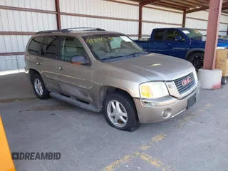 2002 GMC Envoy SLT with VIN 1GKDT13S322466318, listed as a IAAI auction lot 41769024 with 1 mi miles. Bid and sale history available at carsss.com. Image 1.