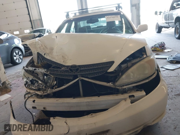 2004 Toyota Camry LE with VIN JTDBE32K540257588, listed as a IAAI auction lot 42208098 with 201,770 mi miles and . Bid and sale history available at DreamBid. Image 12.