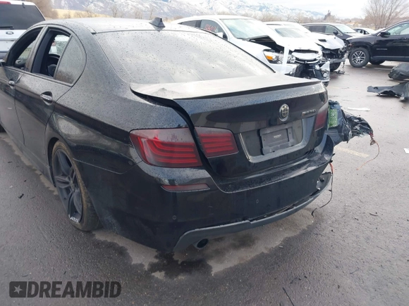 2015 BMW 5 Series 535i with VIN WBA5B1C51FG125924, listed as a IAAI auction lot 41060431 with 102,957 mi miles and . Bid and sale history available at carsss.com. Image 6.