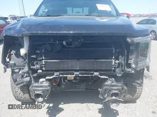 2021 Ford F-150 XL with VIN 1FTFW1ED7MFA77770, listed as a IAAI auction lot 41882929 with 76,099 mi miles and . Bid and sale history available at DreamBid. Image 17.