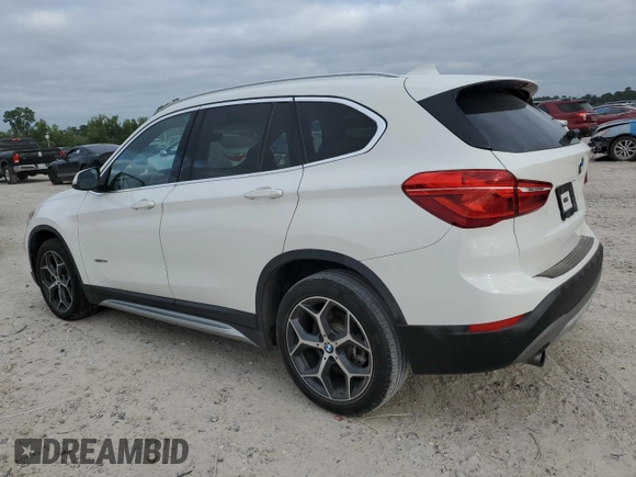 2017 BMW X1 sDrive28i with VIN WBXHU7C37H5H34418, listed as a Copart auction lot 53073995 with 67,980 mi miles and Salvage Title. Bid and sale history available at carsss.com. Image 2.