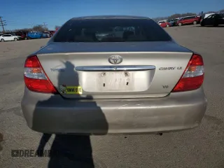 2004 Toyota Camry LE with VIN 4T1BF32K04U574101, listed as a Copart auction lot 47653965 with 0 mi miles and Salvage Title. Bid and sale history available at carsss.com. Image 6.