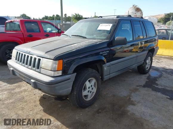 1995 Jeep Grand Cherokee Laredo z VIN 1J4GZ58S9SC553345, wystawiony jako IAAI lot #42772979 z przebiegiem 216 808 mil mil oraz . Historia ofert i sprzedaży dostępna na DreamBid. Obrazek 2.