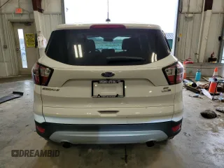 2017 Ford Escape SE with VIN 1FMCU9GD1HUD43687, listed as a Copart auction lot 54596585 with 96,721 mi miles and Clean Title. Bid and sale history available at carsss.com. Image 6.