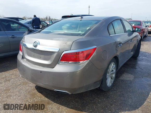 2012 Buick LaCrosse Touring with VIN 1G4GJ5E32CF231104, listed as a IAAI auction lot 41717789 with 134,707 mi miles and . Bid and sale history available at DreamBid. Image 4.