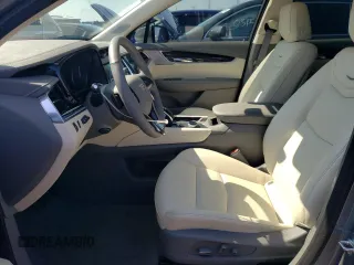 2024 Cadillac XT6 FWD Premium Luxury with VIN 1GYKPCRS7RZ736818, listed as a Copart auction lot 67768804 with 7,145 mi miles and Salvage Title. Bid and sale history available at carsss.com. Image 7.