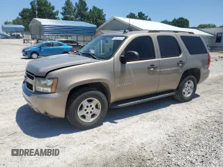 2007 Chevrolet Tahoe LTZ with VIN 1GNFC13J27R174127, listed as a Copart auction lot 61617075 with 216,376 mi miles and Salvage title. Bid and sale history available at DreamBid. Image 1.