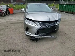 2020 Lexus RX 350 z VIN 2T2HZMDA7LC214475, wystawiony jako Copart lot #57374175 z przebiegiem 41 785 mil mil oraz Szkoda całkowita • Salvage title. Historia ofert i sprzedaży dostępna na DreamBid. Obrazek 14.