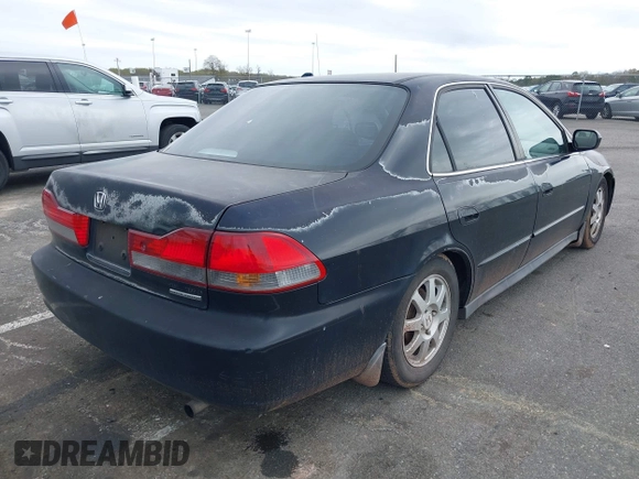 2002 Honda Accord SE z VIN 1HGCG66812A084949, wystawiony jako IAAI lot #42081536 z przebiegiem 309 920 mil mil oraz . Historia ofert i sprzedaży dostępna na DreamBid. Obrazek 4.