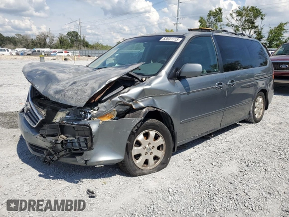 2002 Honda Odyssey EX-L with VIN 2HKRL18962H552809, listed as a Copart auction lot 63631115 with 224,019 mi miles and Salvage title. Bid and sale history available at DreamBid. Image 1.