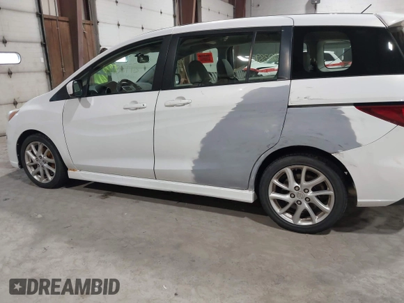 2012 Mazda 5 Grand Touring with VIN JM1CW2DL9C0100114, listed as a IAAI auction lot 42038998 with 160,651 mi miles and . Bid and sale history available at DreamBid. Image 6.