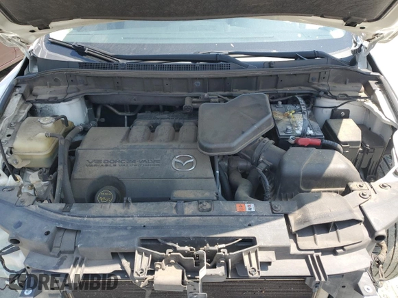 2015 Mazda CX-9 Grand Touring z VIN JM3TB2DA3F0452160, wystawiony jako Copart lot #60220655 z przebiegiem 145 185 mil mil oraz Szkoda całkowita • Salvage title. Historia ofert i sprzedaży dostępna na DreamBid. Obrazek 12.
