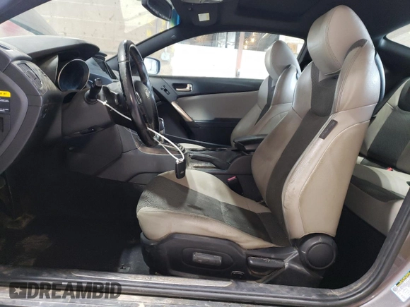 2013 Hyundai Genesis Coupe Premium z VIN KMHHT6KD4DU099557, wystawiony jako Copart lot #58597345 z przebiegiem 70 831 mil mil oraz Tytuł czysty. Historia ofert i sprzedaży dostępna na DreamBid. Obrazek 7.