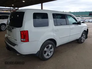 2014 Honda Pilot EX-L with VIN 5FNYF4H59EB047609, listed as a IAAI auction lot 42071353 with 148,661 mi miles and . Bid and sale history available at carsss.com. Image 4.