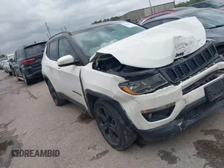 2019 Jeep Compass Altitude with VIN 3C4NJCBB5KT615720, listed as a IAAI auction lot 42148757 with 205,016 mi miles and . Bid and sale history available at DreamBid. Image 1.
