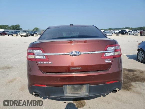 2015 Ford Taurus SEL with VIN 1FAHP2E96FG161735, listed as a Copart auction lot 61865294 with 148,070 mi miles and Salvage Title. Bid and sale history available at DreamBid. Image 6.