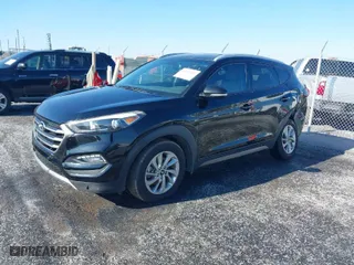 2016 Hyundai Tucson Limited with VIN KM8J33A27GU237225, listed as a IAAI auction lot 41223497 with 158,986 mi miles. Bid and sale history available at carsss.com. Image 2.