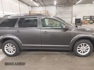 2017 Dodge Journey SXT with VIN 3C4PDDBG1HT512398, listed as a IAAI auction lot 42098784 with 123,946 mi miles and . Bid and sale history available at DreamBid. Image 14.