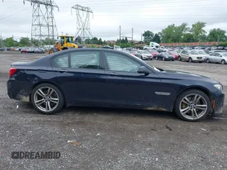 2011 BMW 7 Series 750i xDrive with VIN WBAKC6C57BC394301, listed as a IAAI auction lot 42460658 with 118,600 mi miles and . Bid and sale history available at DreamBid. Image 14.