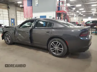 2019 Dodge Charger SXT with VIN 2C3CDXJG4KH520470, listed as a Copart auction lot 51947755 with 90,876 mi miles and Salvage Title. Bid and sale history available at DreamBid. Image 2.