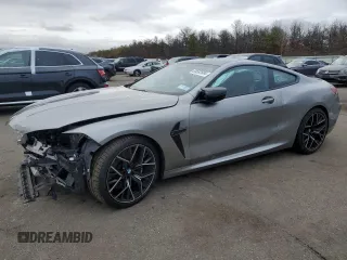 2022 BMW M8 Competition with VIN WBSAE0C03NCJ12338, listed as a Copart auction lot 85582884 with 0 mi miles and Salvage Title. Bid and sale history available at carsss.com. Image 1.