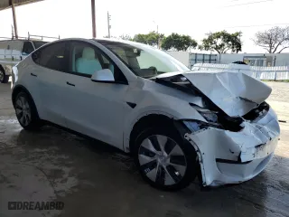2020 Tesla Model Y Long Range with VIN 5YJYGDEEXLF056950, listed as a Copart auction lot 79112844 with 31,714 mi miles and Salvage Title. Bid and sale history available at carsss.com. Image 4.