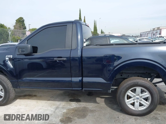 2023 Ford F-150 XL with VIN 1FTMF1C52PKG05729, listed as a IAAI auction lot 41685994 with 12,805 mi miles and . Bid and sale history available at carsss.com. Image 14.