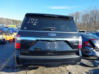 2020 Ford Expedition Max Limited z VIN 1FMJK2AT9LEA11567, wystawiony jako IAAI lot #41592375 z przebiegiem 96 659 mil mil oraz . Historia ofert i sprzedaży dostępna na DreamBid. Obrazek 16.