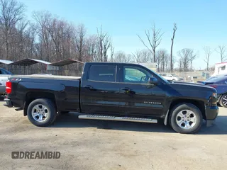 2018 Chevrolet Silverado 1500 LT with VIN 1GCUKREC3JF119906, listed as a IAAI auction lot 41765398 with 122,472 mi miles and . Bid and sale history available at DreamBid. Image 13.