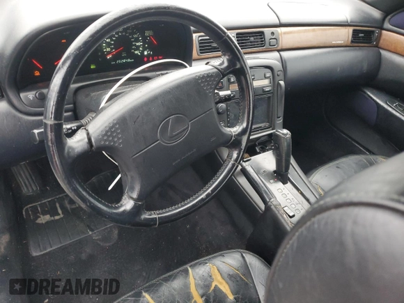 1995 Lexus SC 400 z VIN JT8UZ30CXS0039926, wystawiony jako Copart lot #89373825 z przebiegiem 252 843 mil mil oraz Szkody całkowita. Historia ofert i sprzedaży dostępna na DreamBid. Obrazek 8.