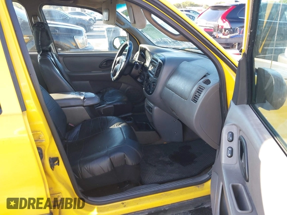 2002 Ford Escape XLS Choice with VIN 1FMYU01132KD56671, listed as a IAAI auction lot 41552541 with 245,923 mi miles and . Bid and sale history available at DreamBid. Image 5.