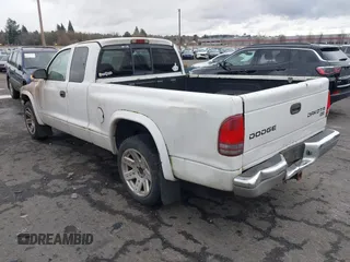 2003 Dodge Dakota SLT with VIN 1D7HL42N83S296040, listed as a IAAI auction lot 41462371 with 250,407 mi miles. Bid and sale history available at carsss.com. Image 3.