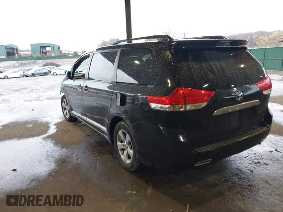 2014 Toyota Sienna LE AAS with VIN 5TDKK3DC7ES426751, listed as a IAAI auction lot 41975870 with 100,000 mi miles and . Bid and sale history available at carsss.com. Image 3.