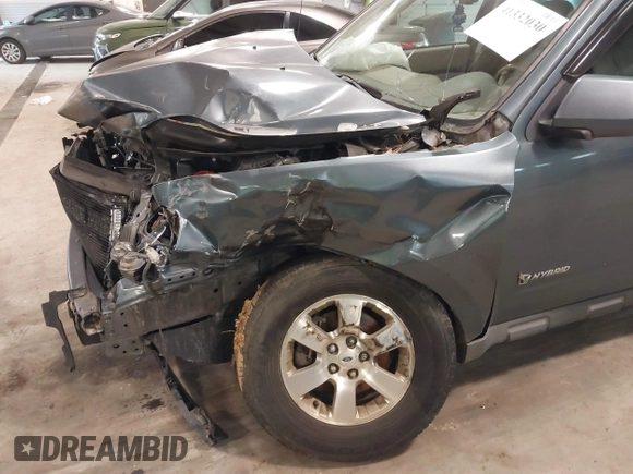 2010 Ford Escape Hybrid with VIN 1FMCU4K31AKC15842, listed as a IAAI auction lot 41332030 with 490,296 mi miles and . Bid and sale history available at DreamBid. Image 13.