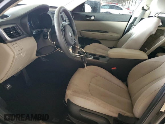 2017 Kia Optima LX z VIN 5XXGT4L31HG164323, wystawiony jako Copart lot #59189335 z przebiegiem 60 354 mil mil oraz Szkoda całkowita • Salvage title. Historia ofert i sprzedaży dostępna na DreamBid. Obrazek 7.