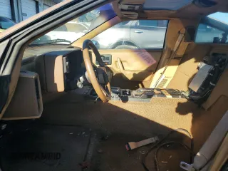 1987 Pontiac Fiero GT z VIN 1G2PG119XHP200243, wystawiony jako Copart lot #74389864 z przebiegiem 109 478 mil mil oraz Tytuł czysty. Historia ofert i sprzedaży dostępna na DreamBid. Obrazek 7.