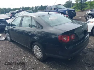 2008 Volkswagen Jetta Sedan S with VIN 3VWJZ71K28M102750, listed as a IAAI auction lot 39861440 with 56,089 mi miles. Bid and sale history available at carsss.com. Image 3.