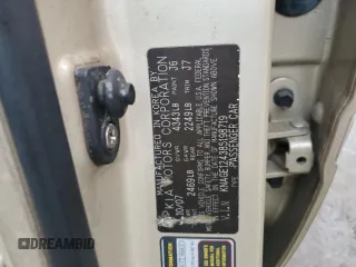 2008 Kia Optima LX z VIN KNAGE124385198719, wystawiony jako Copart lot #55449255 z przebiegiem 156 972 mil mil oraz Szkoda całkowita • Salvage title. Historia ofert i sprzedaży dostępna na DreamBid. Obrazek 12.