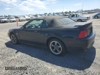 2003 Ford Mustang GT Deluxe z VIN 1FAFP45X23F436939, wystawiony jako Copart lot #61106135 z przebiegiem 105 860 mil mil oraz Czysty tytuł • Clean title. Historia ofert i sprzedaży dostępna na DreamBid. Obrazek 2.