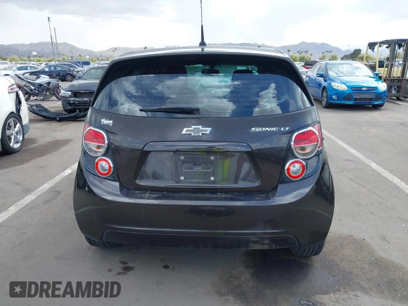 2014 Chevrolet Sonic LT with VIN 1G1JC6SHXE4135948, listed as a IAAI auction lot 41949833 with 127,202 mi miles. Bid and sale history available at carsss.com. Image 17.