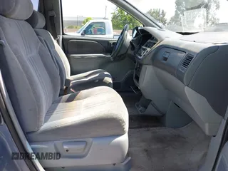 1999 Toyota Sienna LE z VIN 4T3ZF13C6XU159760, wystawiony jako IAAI lot #42332639 z przebiegiem 208 029 mil mil oraz . Historia ofert i sprzedaży dostępna na DreamBid. Obrazek 5.