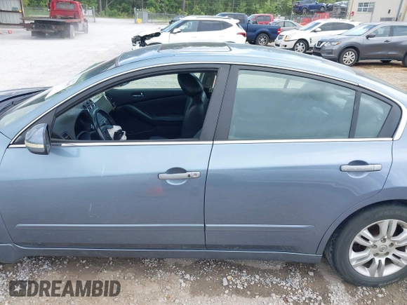 2010 Nissan Altima S with VIN 1N4AL2AP7AN493074, listed as a IAAI auction lot 42065457 with 178,923 mi miles and . Bid and sale history available at DreamBid. Image 14.
