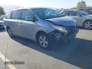 2013 Toyota Sienna LE AAS with VIN 5TDKK3DC6DS371126, listed as a IAAI auction lot 42006353 with 141,425 mi miles. Bid and sale history available at carsss.com. Image 1.