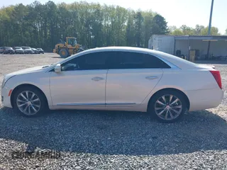 2014 Cadillac XTS with VIN 2G61L5S3XE9231858, listed as a IAAI auction lot 41941564 with 158,479 mi miles. Bid and sale history available at carsss.com. Image 14.