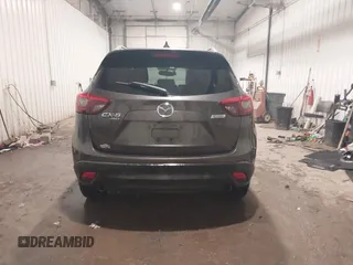 2016 Mazda CX-5 Grand Touring with VIN JM3KE4DY0G0732843, listed as a IAAI auction lot 41520889 with 149,798 mi miles. Bid and sale history available at carsss.com. Image 16.