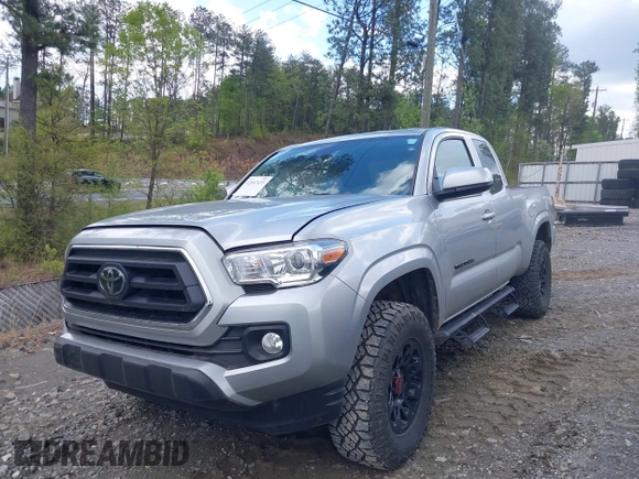 2023 Toyota Tacoma SR with VIN 3TYRX5GNXPT069128, listed as a IAAI auction lot 42007435 with 18,000 mi miles and . Bid and sale history available at DreamBid. Image 2.