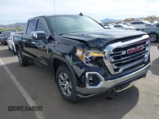 2021 GMC Sierra 1500 SLT z VIN 3GTU9DET7MG420888, wystawiony jako IAAI lot #42164095 z przebiegiem 62 686 mil mil oraz . Historia ofert i sprzedaży dostępna na DreamBid. Obrazek 1.