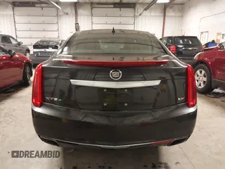 2014 Cadillac XTS Platinum with VIN 2G61W5S88E9186969, listed as a IAAI auction lot 41422872 with 184,998 mi miles and . Bid and sale history available at DreamBid. Image 16.